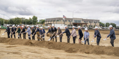 South Dakota State officials and contractors officially shovel dirt at the groundbreaking ceremony in Sioux Falls